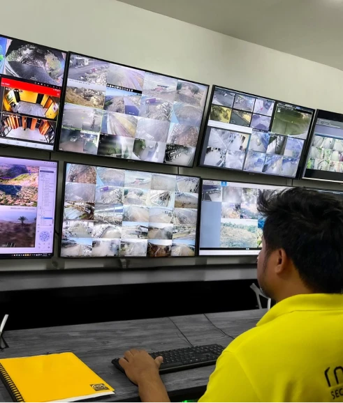 guard-watching-surveillence-camera-footage